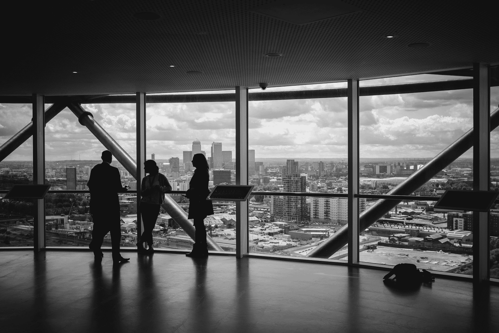 a few people watching  the skyline